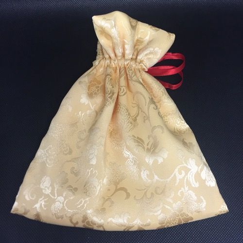 Brocade pouch M yellow